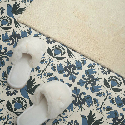 Carreaux vinyle Un graphique d'un oiseau entouré de fleurs