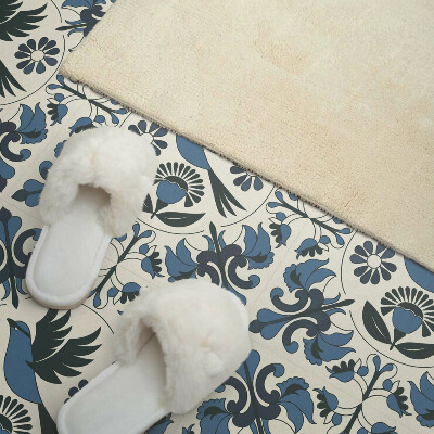 Carreaux vinyle Un graphique d'un oiseau entouré de fleurs