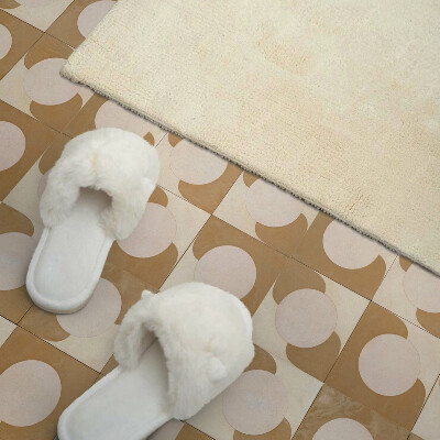 Carreaux de vinyle auto-adhésifs Un motif de cercles et d'arcs dans un style géométrique