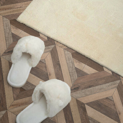 Carreaux de vinyle auto-adhésifs Un motif de planches naturelles dans des tons de marron