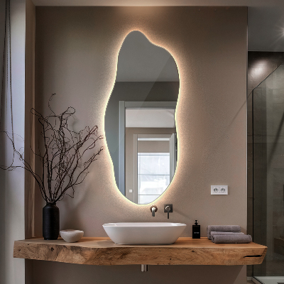 Miroir lumineux aux formes irrégulières