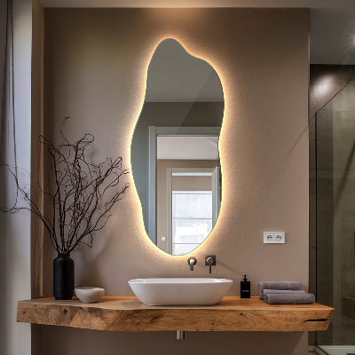 Miroir lumineux aux formes irrégulières