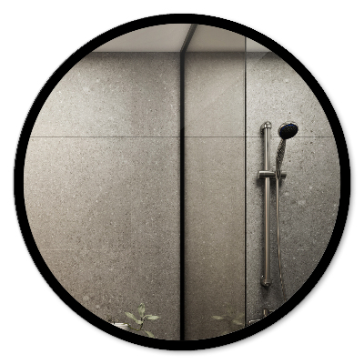 Miroir rond avec un cadre noir