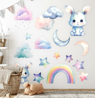 Autocollant mural 100x134 Lapins dans un ciel pastel avec un arc-en-ciel et des étoiles
