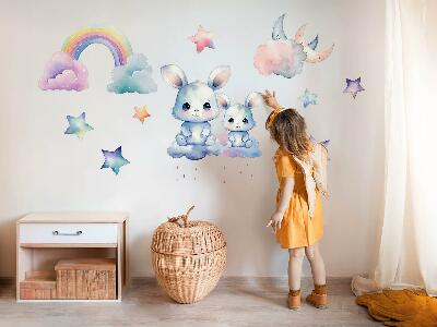 Autocollant mural 60x80 Lapins dans un ciel pastel avec un arc-en-ciel et des étoiles
