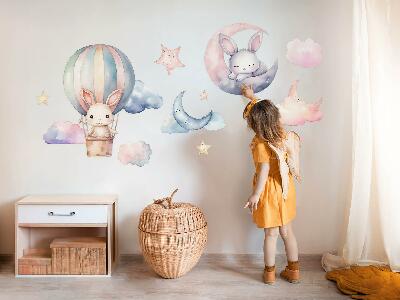 Autocollant mural 80x106 Lapins dans un ciel pastel avec un ballon la nuit