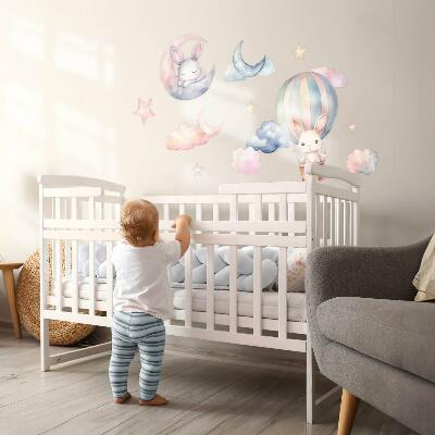 Autocollant mural 80x106 Lapins dans un ciel pastel avec un ballon la nuit