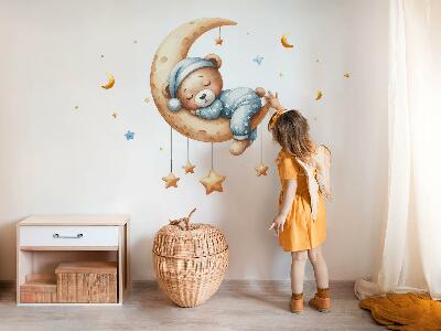 Autocollant mural 80x105 Ours en peluche endormi sur la lune dans un espace pastel