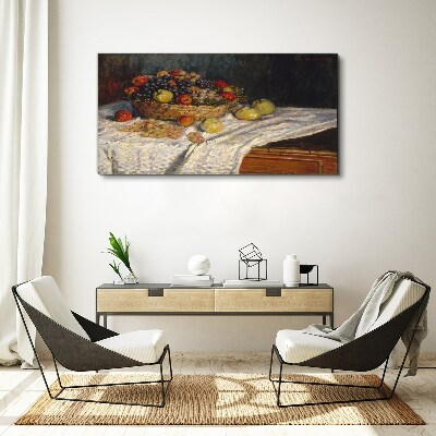 Tableau toile imprimée Corbeille de fruits sur une nappe blanche