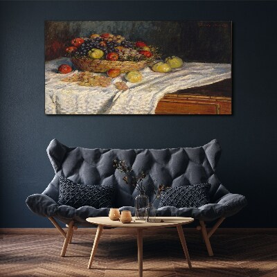 Tableau toile imprimée Corbeille de fruits sur une nappe blanche