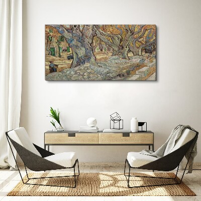 Tableau toile imprimée Une rue bordée d'arbres sous le soleil printanier