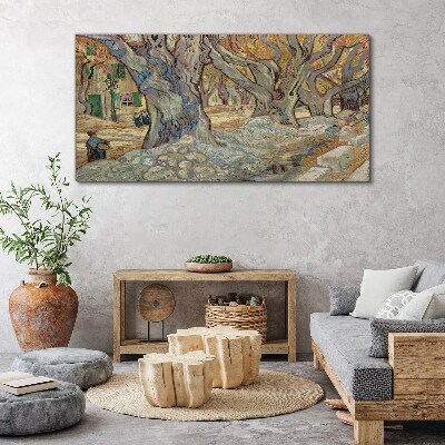 Tableau toile imprimée Une rue bordée d'arbres sous le soleil printanier