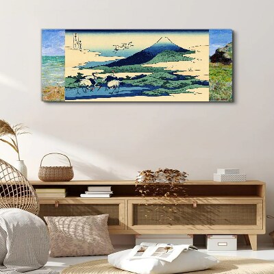 Tableau imprimé sur toile Grues près d'une montagne