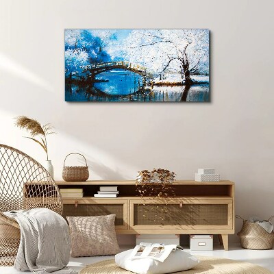 Tableau sur toile Pont d'hiver dans un paysage bleu