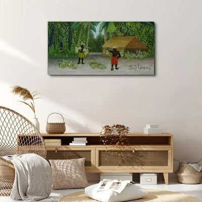 Tableau imprimé sur toile Récolte de bananes dans un paysage tropical