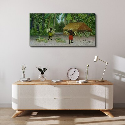 Tableau imprimé sur toile Récolte de bananes dans un paysage tropical