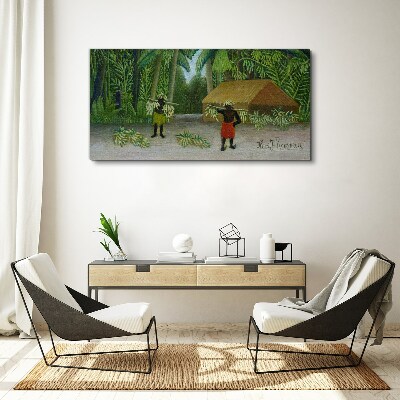Tableau imprimé sur toile Récolte de bananes dans un paysage tropical