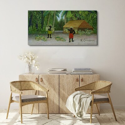 Tableau imprimé sur toile Récolte de bananes dans un paysage tropical