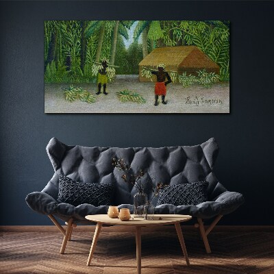 Tableau imprimé sur toile Récolte de bananes dans un paysage tropical