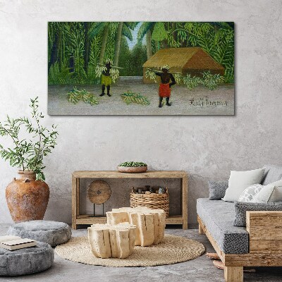 Tableau imprimé sur toile Récolte de bananes dans un paysage tropical