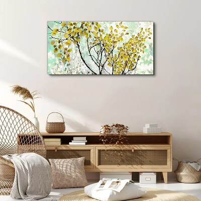 Tableau sur toile Feuilles de printemps sur fond bleu