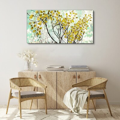 Tableau sur toile Feuilles de printemps sur fond bleu