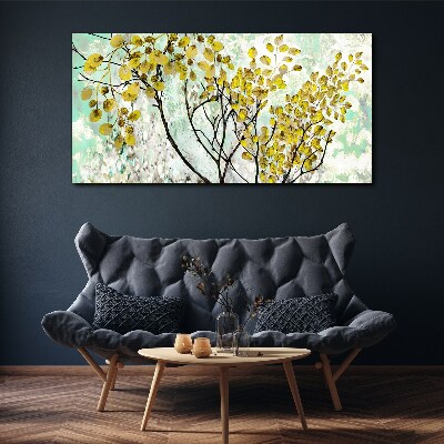 Tableau sur toile Feuilles de printemps sur fond bleu