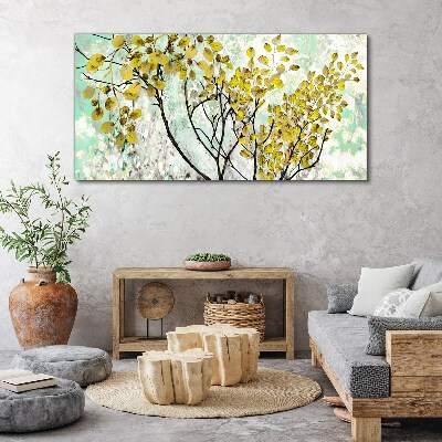 Tableau sur toile Feuilles de printemps sur fond bleu