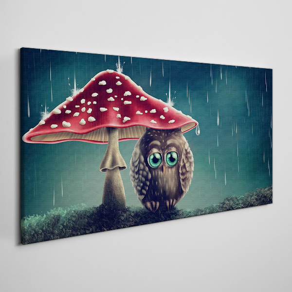 Tableau sur toile Un hibou sous un champignon sous la pluie