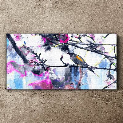 Tableau imprimé sur toile Un oiseau coloré sur un fond de fleurs