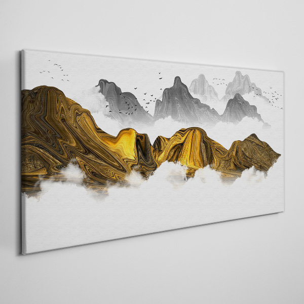 Tableau imprimé sur toile Des montagnes dorées dans les nuages