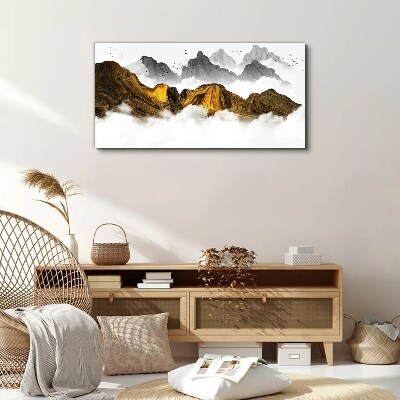 Tableau imprimé sur toile Des montagnes dorées dans les nuages