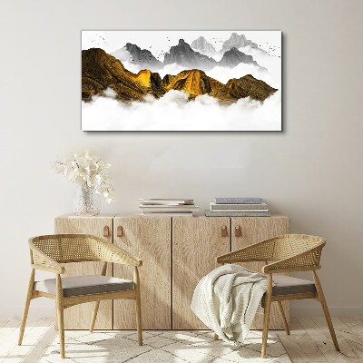 Tableau imprimé sur toile Des montagnes dorées dans les nuages