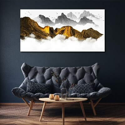 Tableau imprimé sur toile Des montagnes dorées dans les nuages