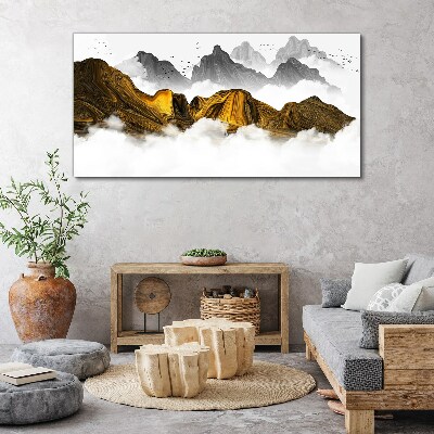 Tableau imprimé sur toile Des montagnes dorées dans les nuages