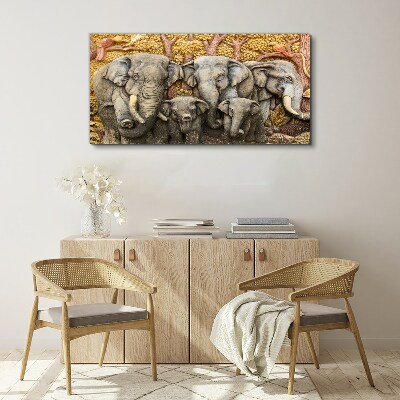 Tableau toile imprimée Une famille d'éléphants dans un paysage forestier