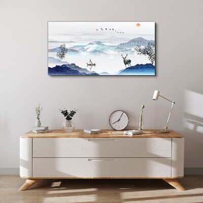 Tableau imprimé sur toile Un paysage de montagne paisible avec un cerf