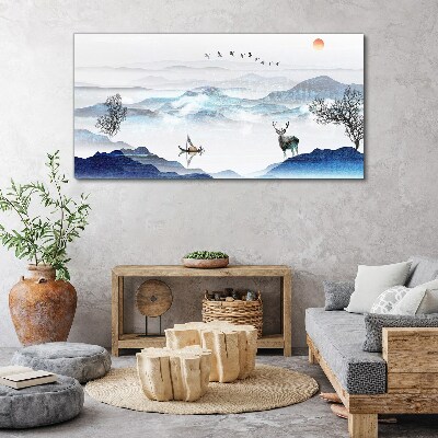 Tableau imprimé sur toile Un paysage de montagne paisible avec un cerf