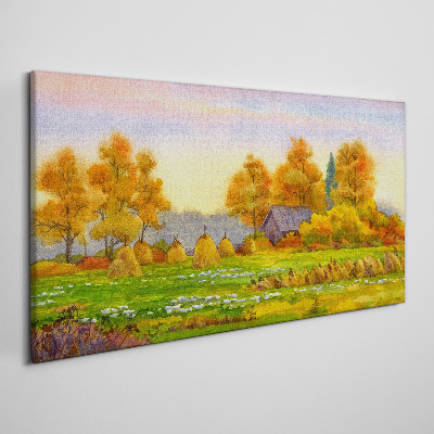 Tableau sur toile Village d'automne avec un verger et des meules de foin