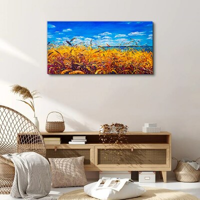 Tableau sur toile Champs dorés sous un ciel bleu