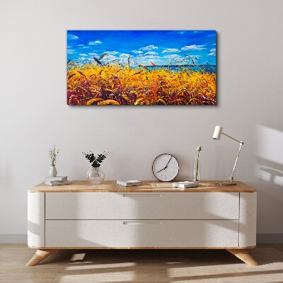 Tableau sur toile Champs dorés sous un ciel bleu