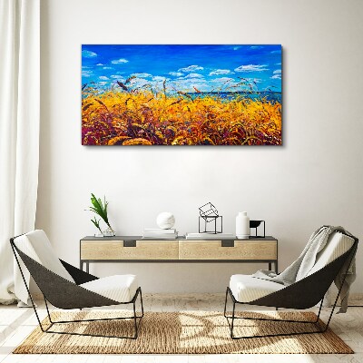 Tableau sur toile Champs dorés sous un ciel bleu