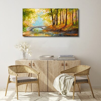 Tableau sur toile Un pont dans la forêt d'automne