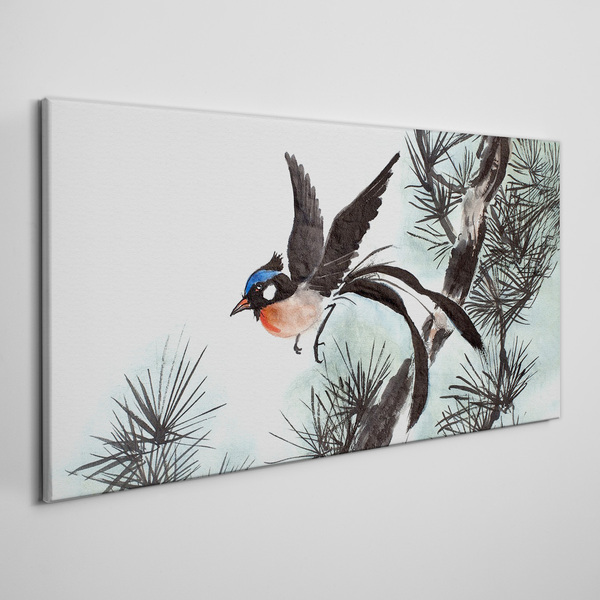 Tableau sur toile Un oiseau en vol au-dessus des pins