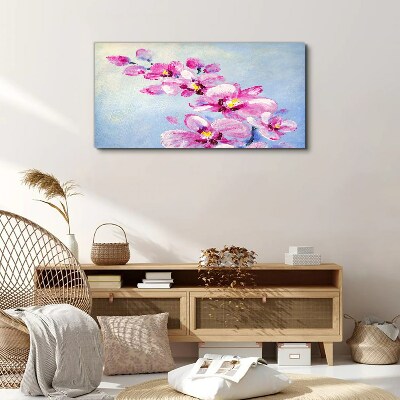 Tableau sur toile Orchidées roses sur fond bleu