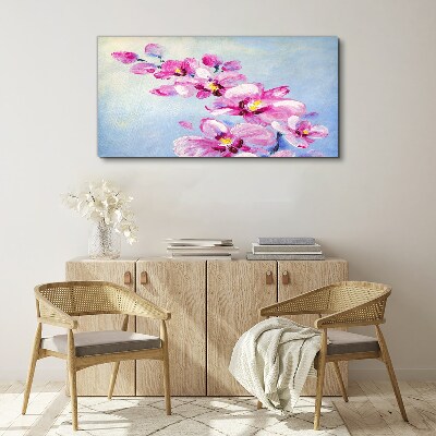 Tableau sur toile Orchidées roses sur fond bleu