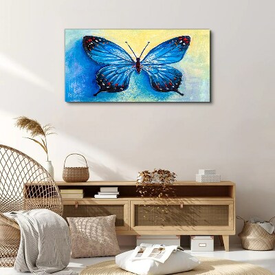 Tableau toile imprimée Papillon bleu sur fond abstrait