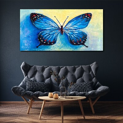 Tableau toile imprimée Papillon bleu sur fond abstrait