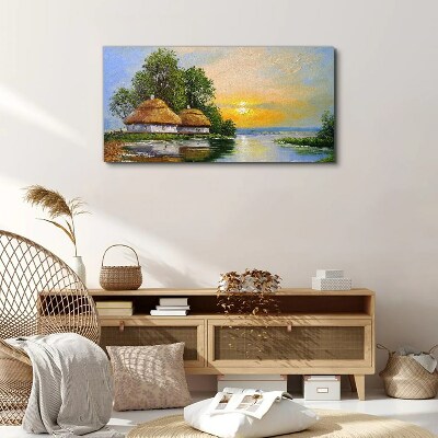 Tableau toile imprimée Un coucher de soleil paisible sur le village