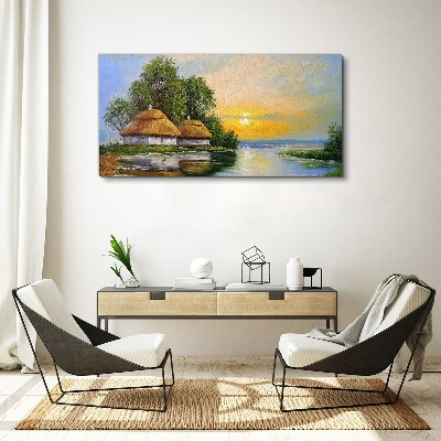 Tableau toile imprimée Un coucher de soleil paisible sur le village